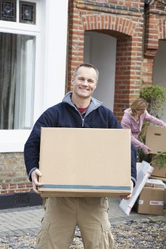 Professional removalists packing items for a move in Albion