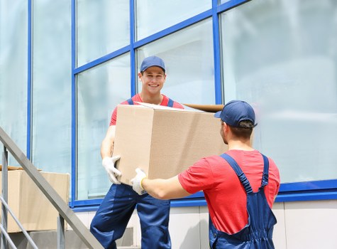 Professional removalist team handling furniture