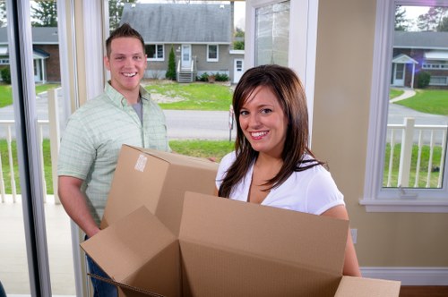 Experienced team packing furniture