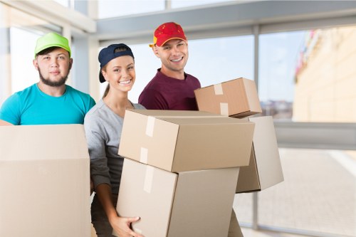 Experienced movers handling furniture with care in Highgate