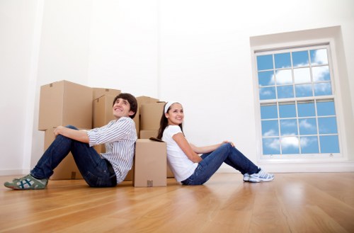 Experienced movers handling delicate items with care