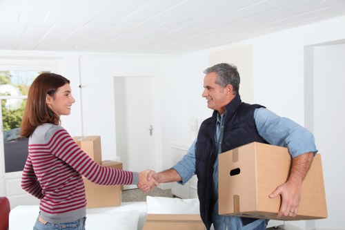 Experienced team handling furniture during a move