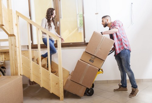 Driver inspecting a moving truck before departure