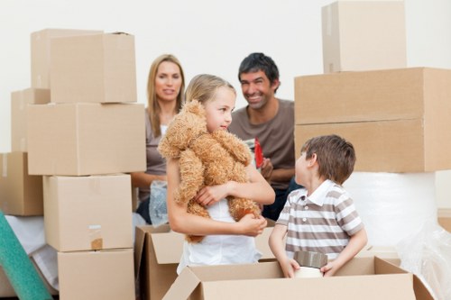 Experienced movers loading furniture onto a truck